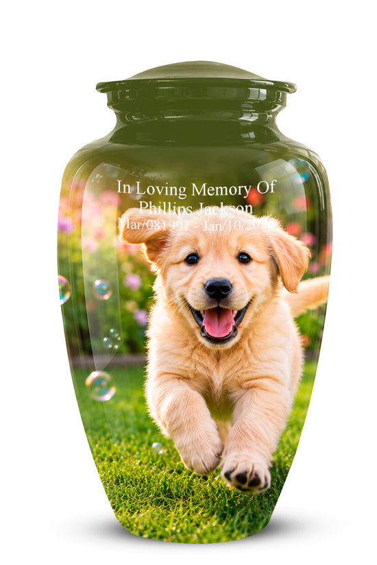 A glossy dark green pet memorial urn with a lid, featuring a printed photo of a golden retriever puppy running on grass with the text 'In Loving Memory Of Phillips Jackson' and dates on the front.