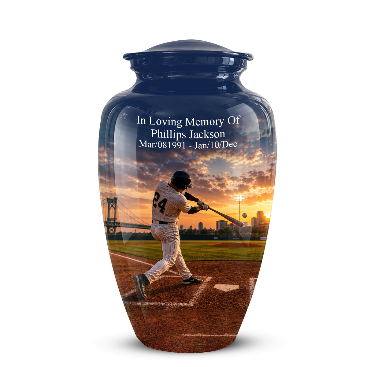 A glossy dark blue memorial urn with a lid, featuring a printed baseball player at bat over a sunset field scene and personalized white text reading 'In Loving Memory Of Phillips Jackson' with dates.