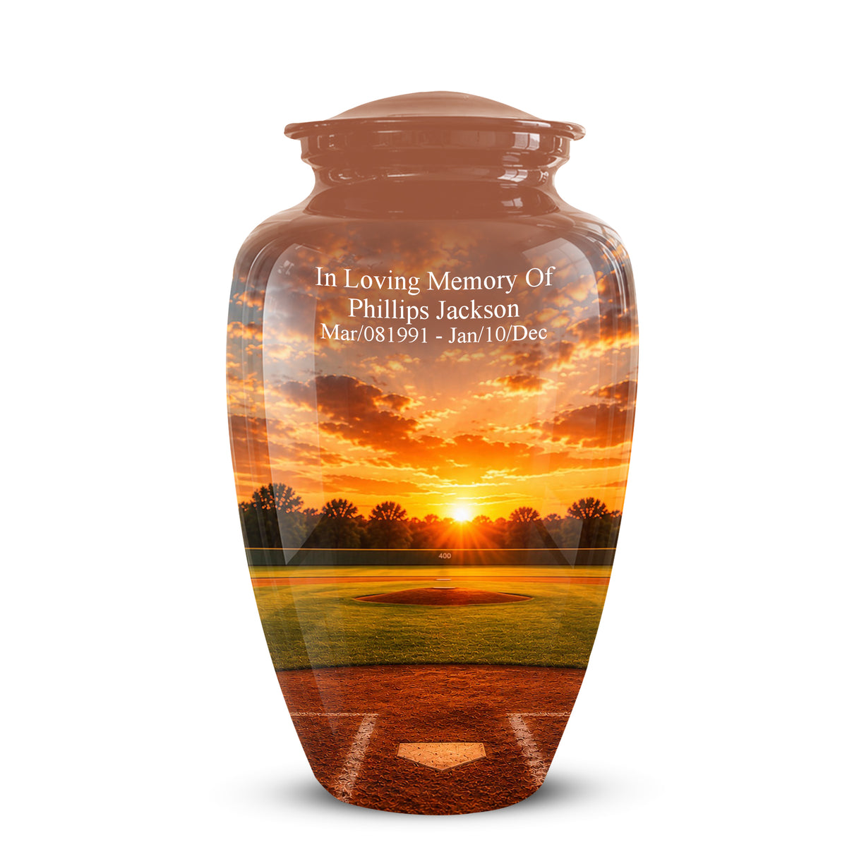A glossy ceramic memorial urn featuring a printed baseball field sunset design, with custom white text on the front reading 'In Loving Memory Of Phillips Jackson' and dates below, shown on a white background.