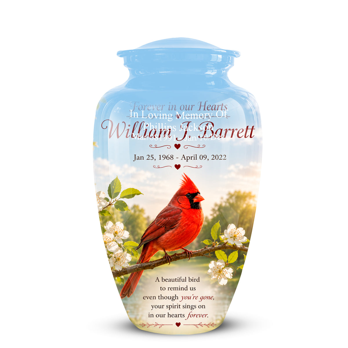 A personalized light blue glass cremation urn with a lid, featuring a printed design of a red cardinal on a flowering branch with the name 'William F. Barrett' and memorial text.