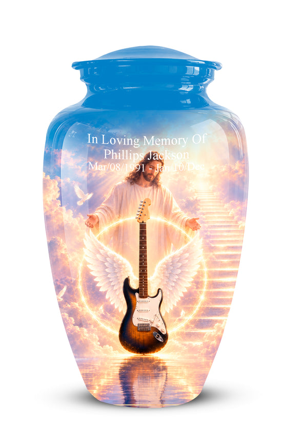 A personalized ceramic cremation urn with a blue lid and base, featuring a printed graphic of an angel with wings holding a brown electric guitar, set against a background of golden clouds and white stairs. White personalized text is printed on the front.