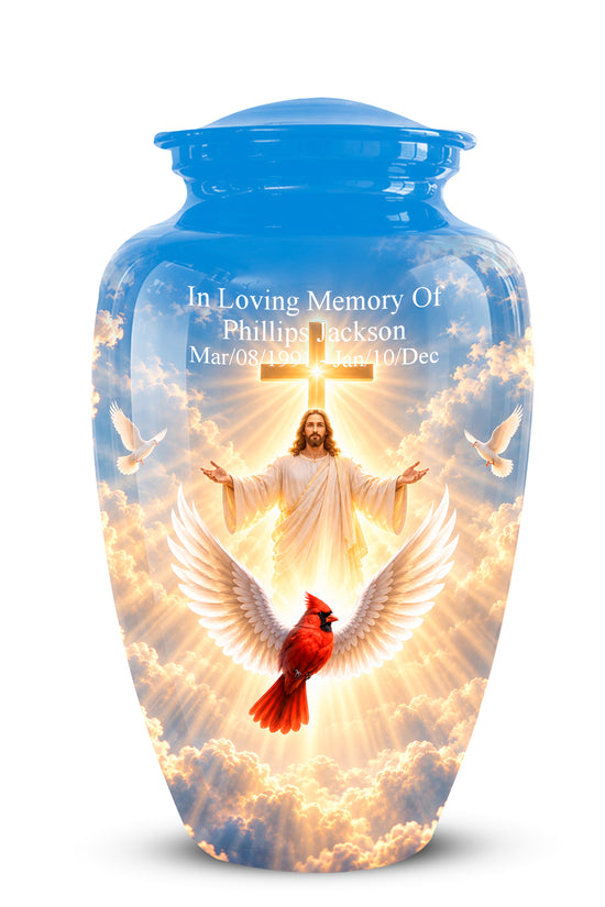A glossy blue ceramic cremation urn with a printed religious design featuring Jesus Christ, doves, clouds, and a red cardinal, with personalized white text on the front.