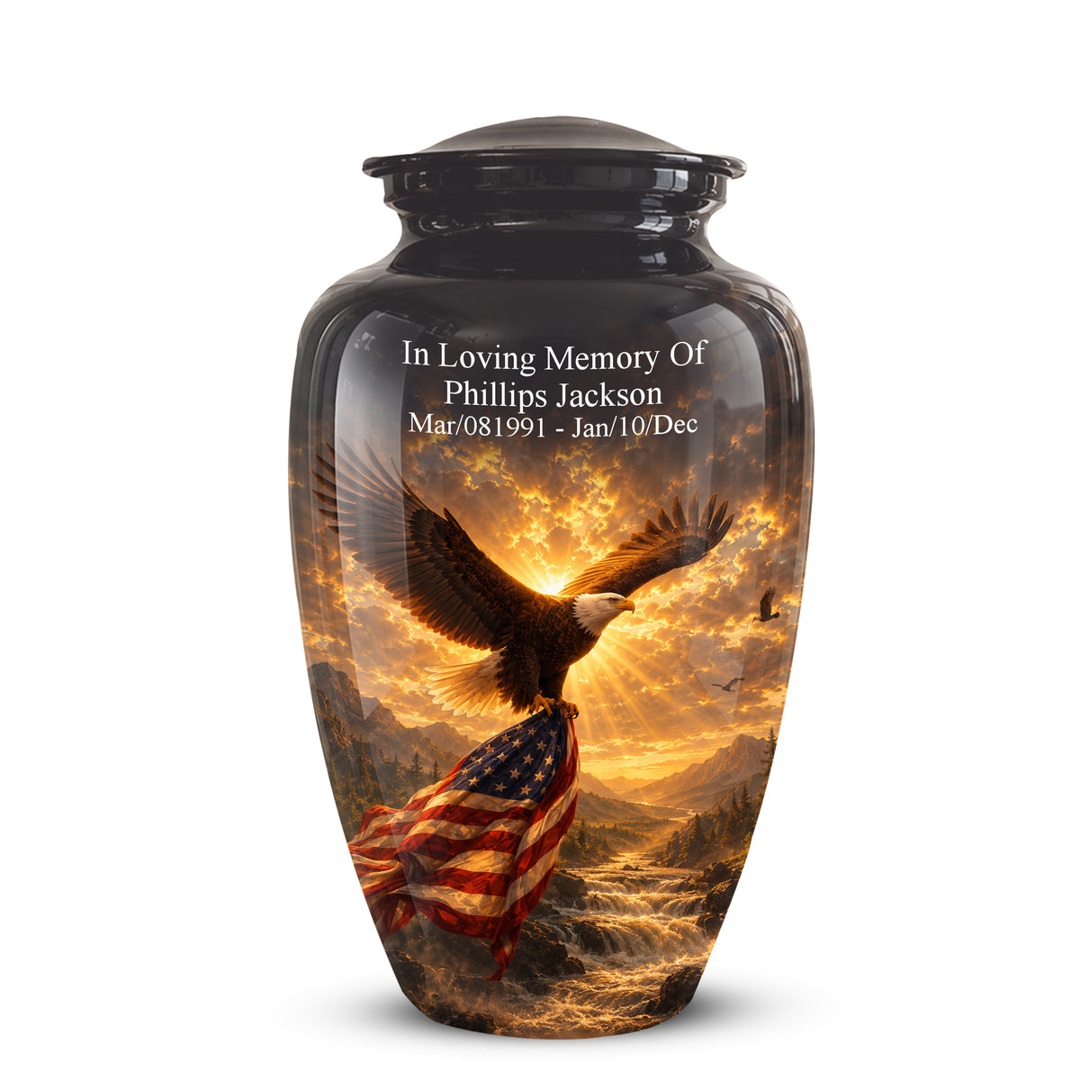 A glossy black cremation urn with a lid, featuring a printed design of a bald eagle flying over a sunset landscape with an American flag draped below. Custom white text on the front reads 'In Loving Memory Of Phillips Jackson' with dates below.