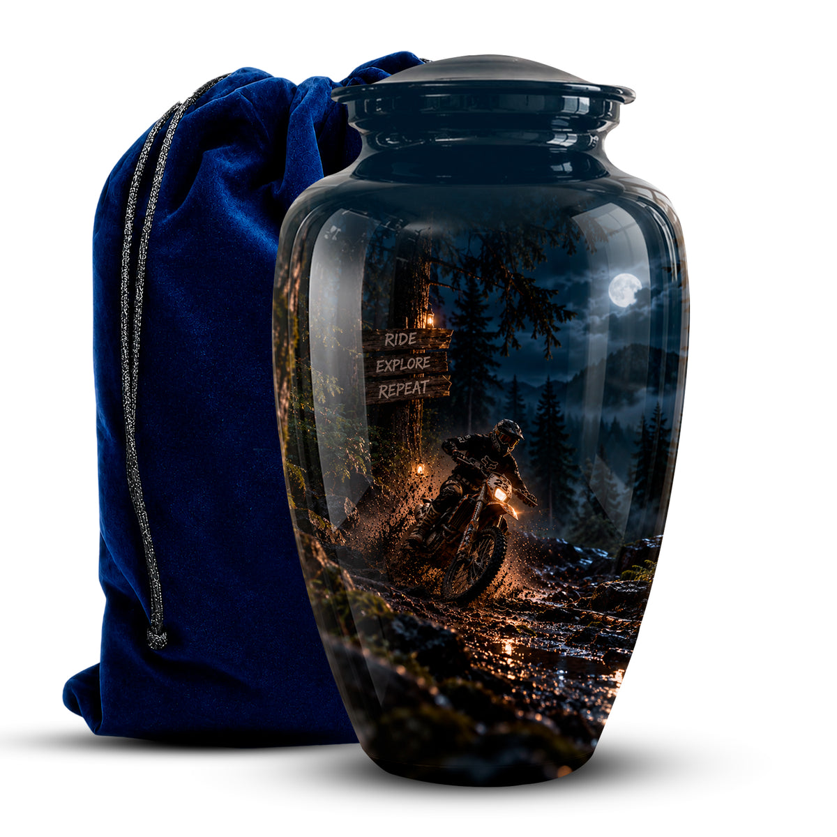 A glossy black ceramic cremation urn with a lid, featuring a printed scenic graphic of a mountain biker at night on a forest trail. A dark blue velvet drawstring bag is positioned behind the urn on a white background.