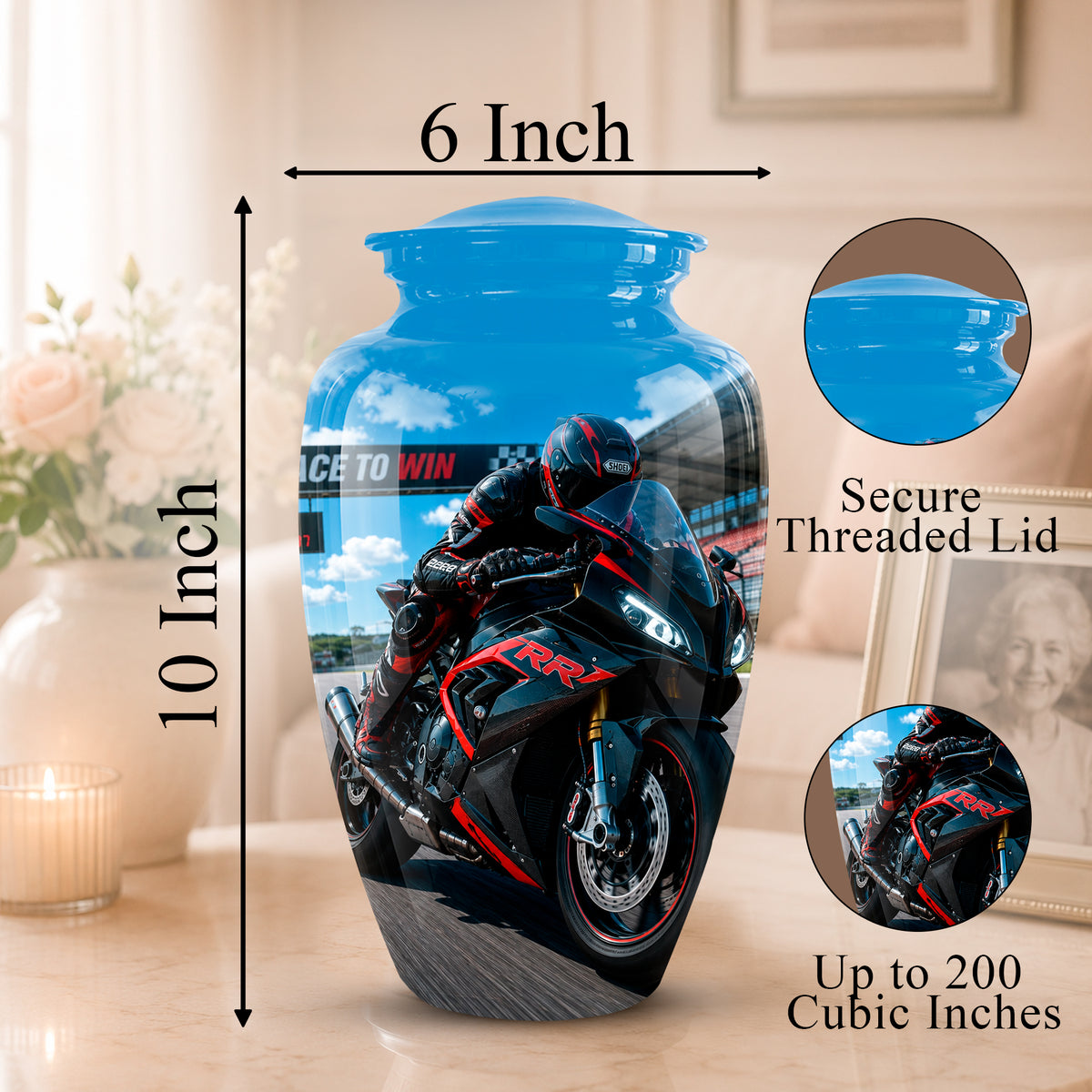 A printed ceramic or glass urn shaped like a blue motorcycle-themed jar, shown with dimension labels reading 6 Inch across the top and 10 Inch tall on the left. The jar features a printed motorcycle racer and bike design, with circular inset close-ups and text noting 'Secure Threaded Lid' and 'Up to 200 Cubic Inches.