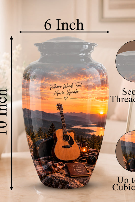 Personalized glass urn vase with a sunset landscape print featuring an acoustic guitar and mountains, shown with dimension labels of 10 inch height and 6 inch width, plus inset circles demonstrating the secure threaded lid and large storage capacity up to 200 cubic inches.