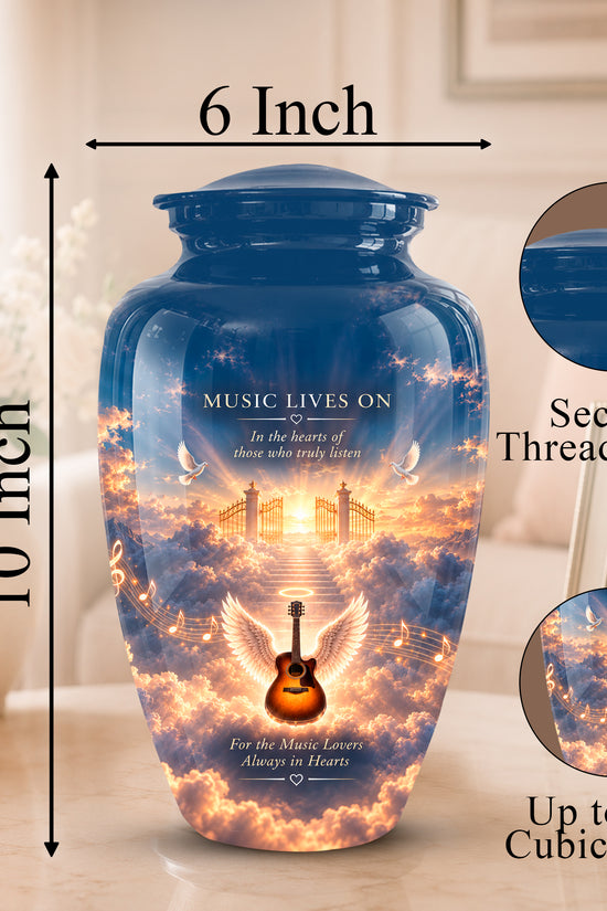 Personalized blue urn with a glowing golden angel and guitar design, shown with dimension labels of 10 inch height and 6 inch width, plus circular inset close-ups of the secure threaded lid and printed detail.