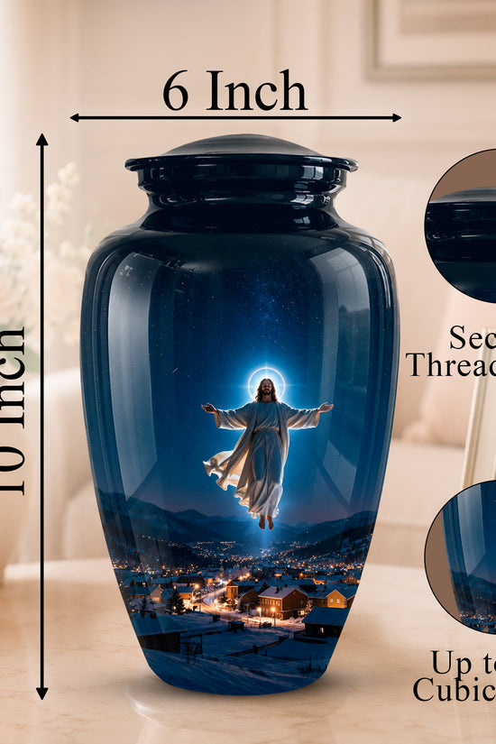 A glossy dark blue glass urn with a printed image of Jesus floating above a glowing town at night. The urn is shown on a tabletop in a softly lit room, with measurement arrows indicating 6 inch width and 10 inch height, plus circular close-ups labeled 'Secure Threaded Lid' and 'Up to 200 Cubic Inches.