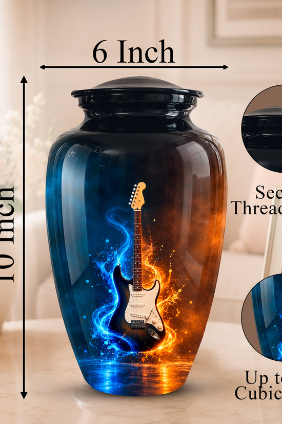 A decorative urn-shaped vase with a threaded lid, shown in a home interior setting. The product is labeled as 10 inches tall by 6 inches wide, with circular inset close-ups highlighting the secure lid and the printed design: a black electric guitar surrounded by glowing blue and orange flame-like effects.