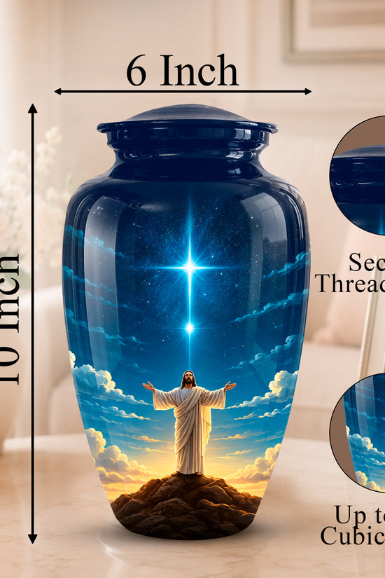 A glossy dark blue ceramic cremation urn with a printed image of Jesus on a hill under a starry sky, shown on a tabletop with dimension labels reading 6 Inch and 10 Inch, plus circular inset close-ups of the lid and printed design.