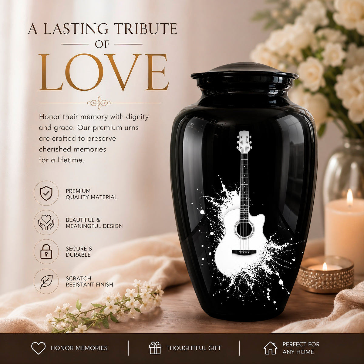 A glossy black ceramic or glass memorial urn with a white guitar graphic and white paint splatter design, displayed on a wooden surface with flowers, a candle, and promotional text reading 'A LASTING TRIBUTE OF LOVE'.
