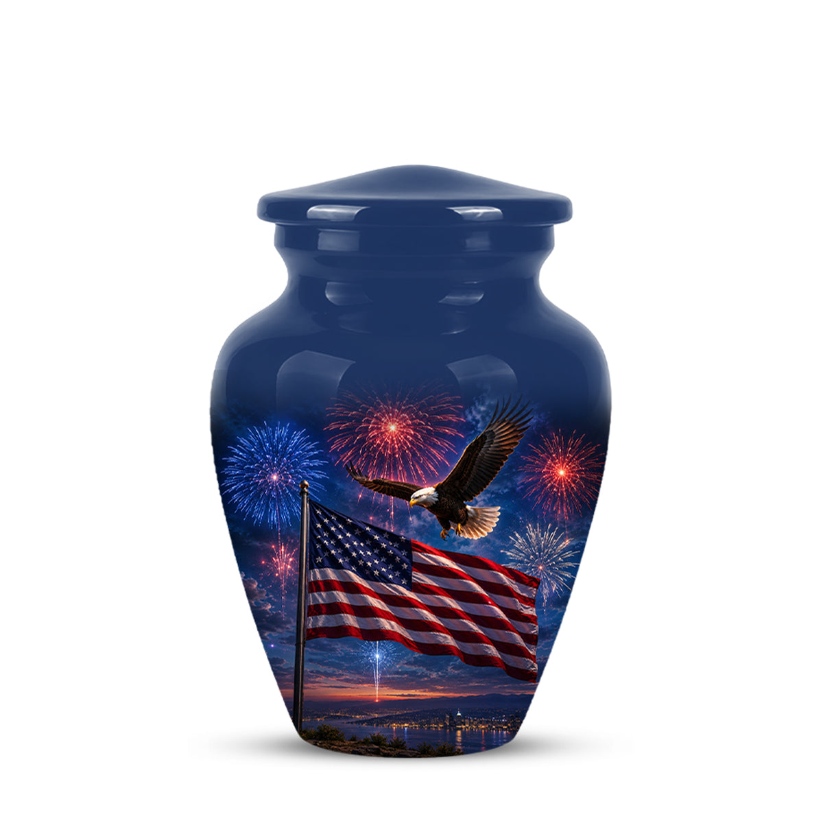 A glossy dark blue urn with a lid, featuring a printed design of an American flag waving, an eagle in flight, and fireworks over water at sunset.