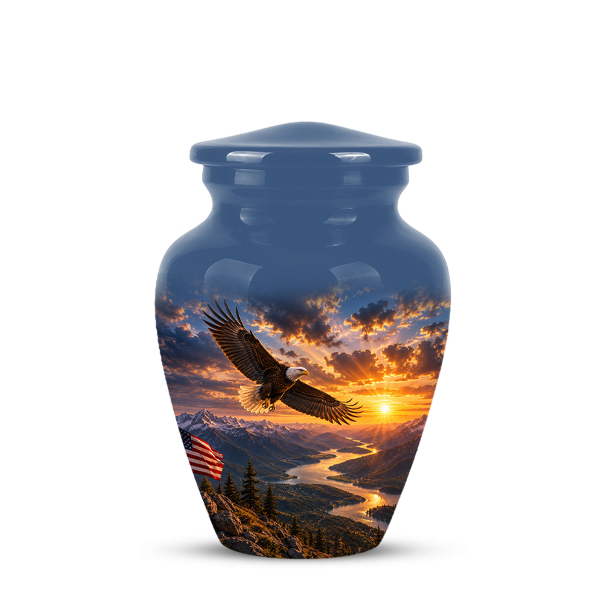 A glossy blue ceramic cremation urn with a lid, featuring a printed scenic design of a bald eagle flying over a mountain river valley at sunset with an American flag in the foreground.