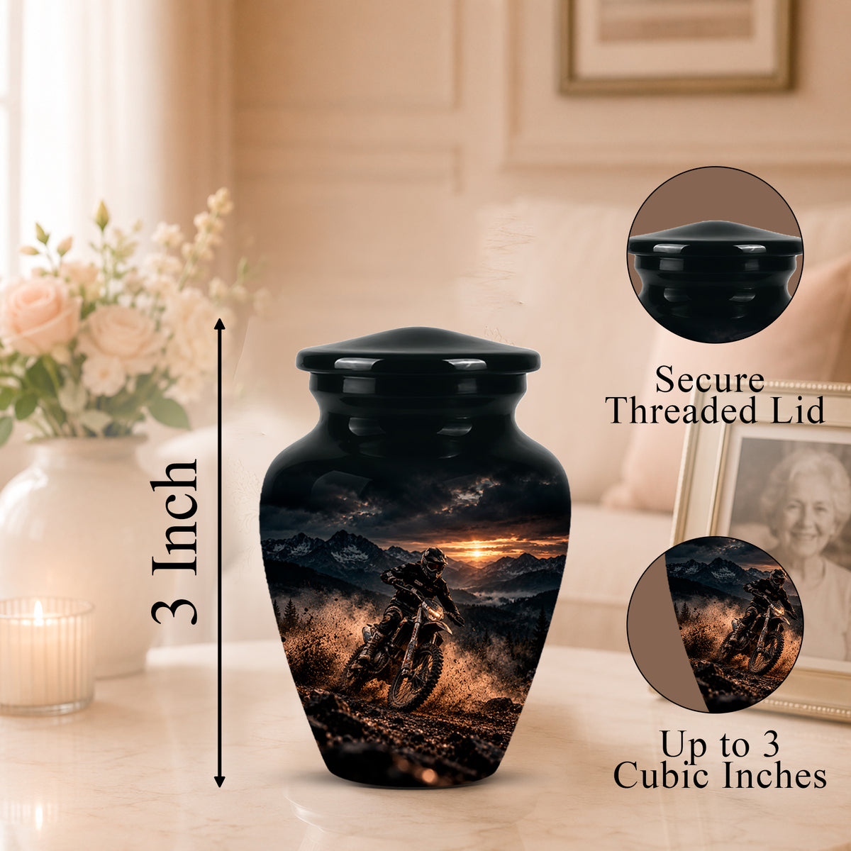Black cremation urn with a printed motorcycle racing sunset design, shown on a tabletop with a flower vase and framed photo in a softly lit room. Callout text indicates 3 inch height and circular insets showing the secure threaded lid and up to 3 cubic inch capacity.