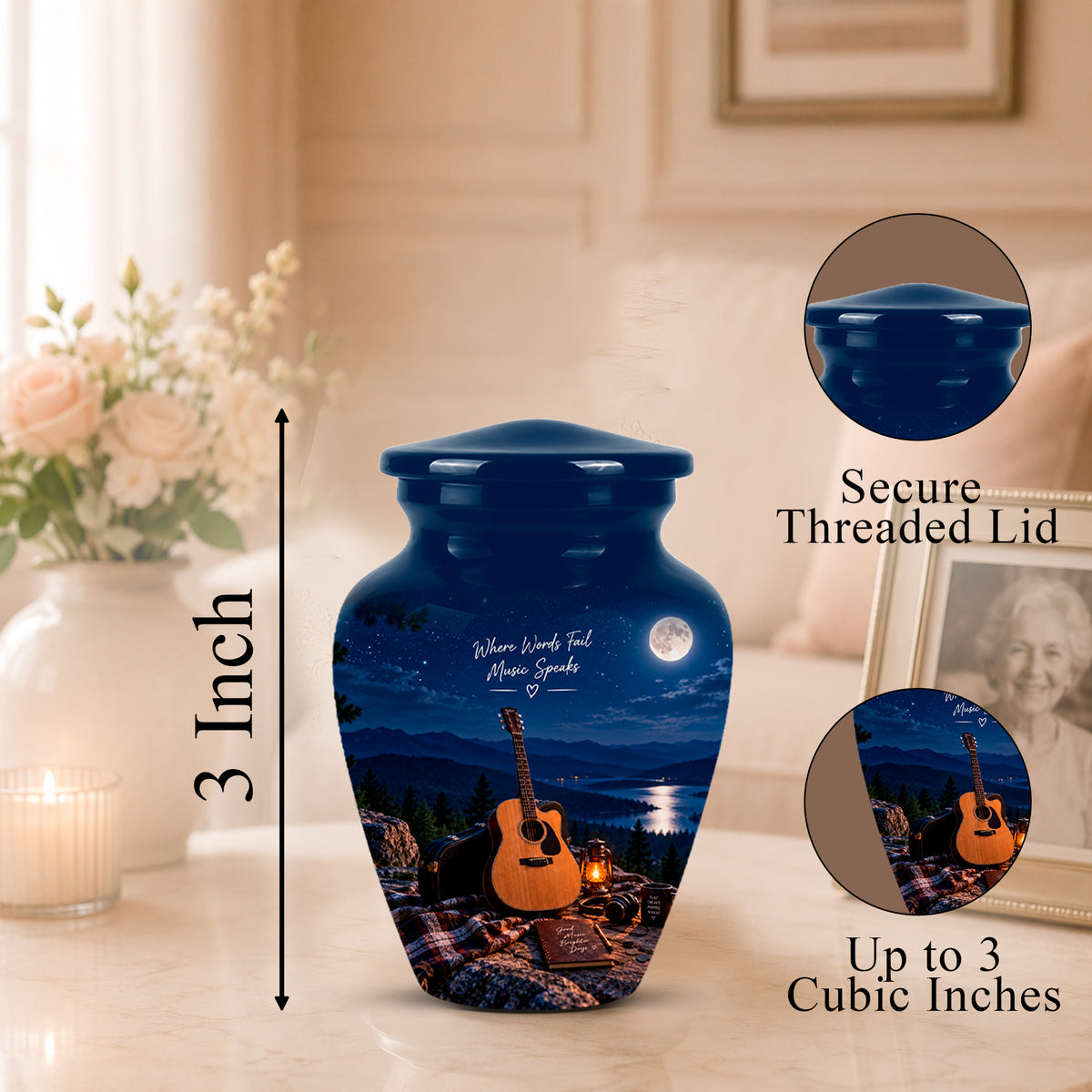 A glossy dark blue urn-shaped memorial vase with a lid, shown on a tabletop in a softly lit room. The vase features a printed night scene with a guitar, candles, moon, and memorial inscription.