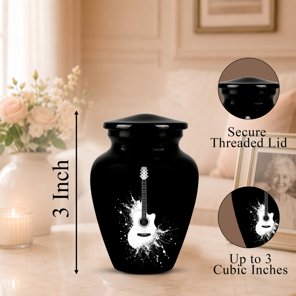 Black ceramic urn with a white guitar graphic and size measurement overlay, shown on a tabletop with decorative flowers and framed photo in a softly lit room. Callout circles highlight the secure threaded lid and up to 3 cubic inch capacity.