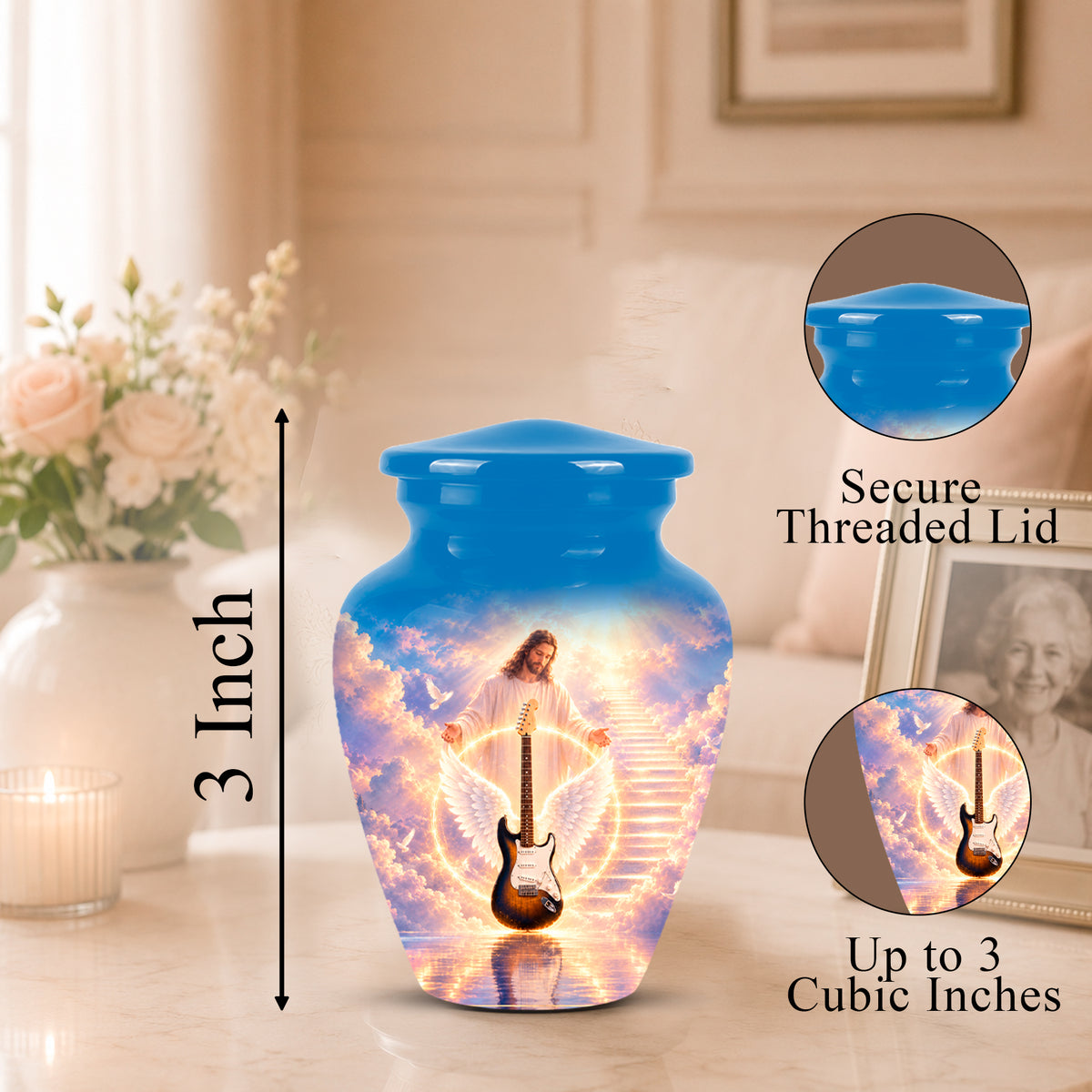 A blue urn-shaped memorial vase with a printed image of Jesus on a guitar in a glowing sky, shown on a tabletop with a framed photo and flowers in the background. Callout graphics indicate a 3-inch height and mention a secure threaded lid and up to 3 cubic inches capacity.