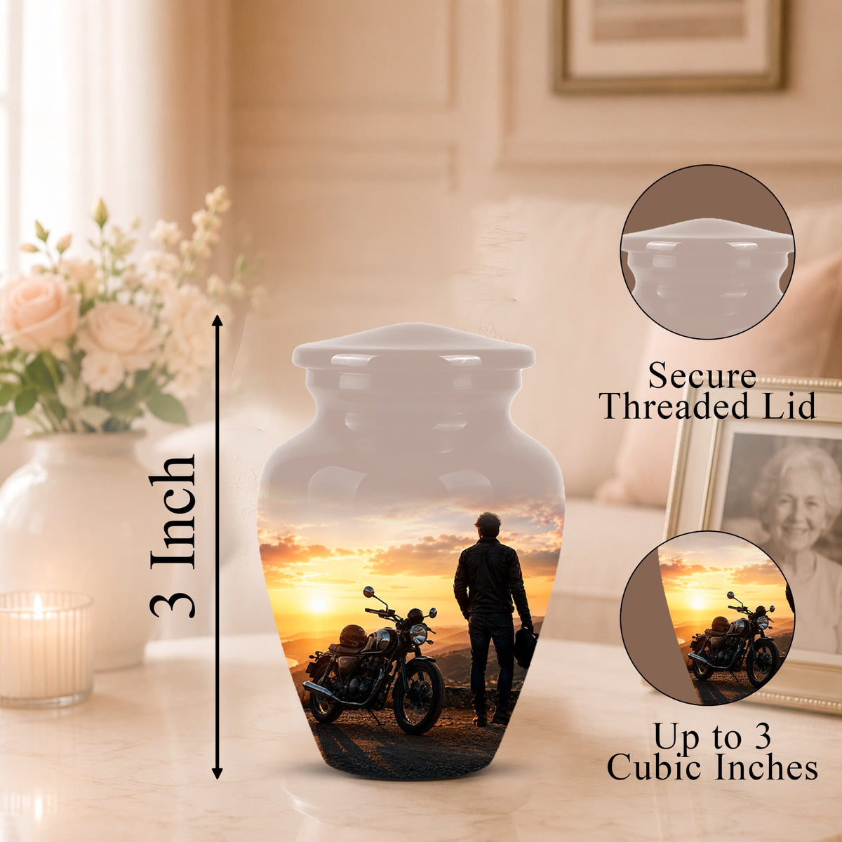 Personalized ceramic urn with a printed motorcycle and sunset photo design, shown on a tabletop with a blurred home interior background. The image includes a 3-inch height marker, a close-up inset of the secure threaded lid, and a circular inset showing up to 3 cubic inches of space for a photo.