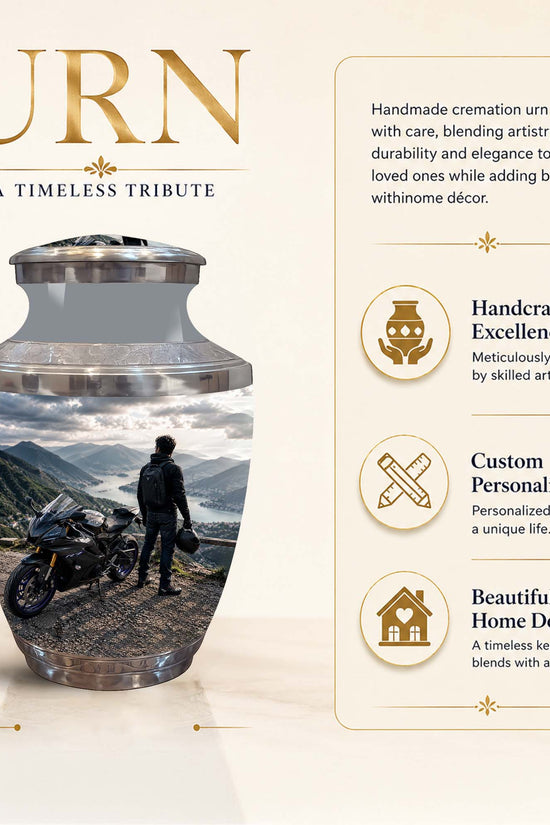 A cremation urn product graphic on a warm beige background with text callouts. The urn is shown as a tall, narrow vase with a printed scenic photo of a motorcyclist on a mountain road.