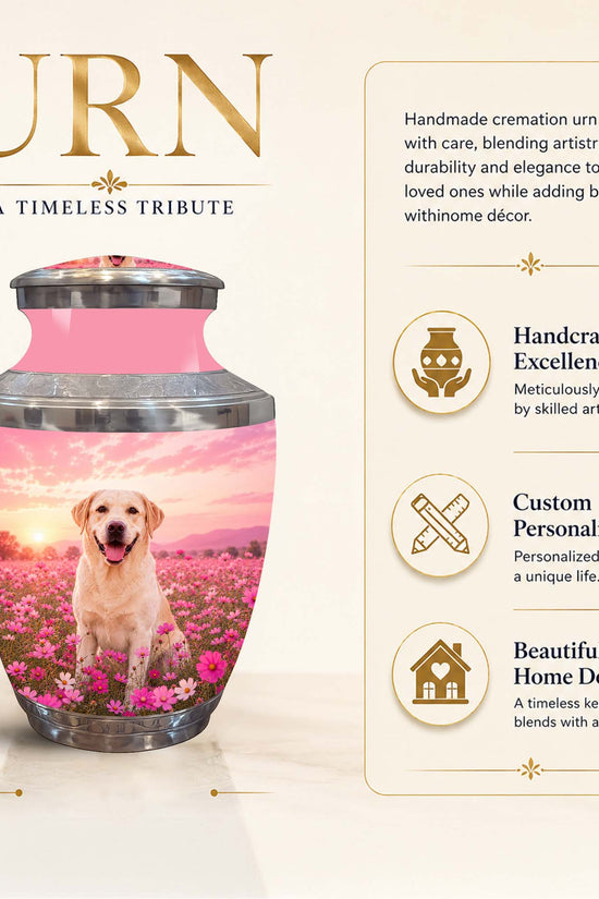 Personalized cremation urn featuring a printed photo of a yellow Labrador retriever in a pink flower field under a pink sunset sky. The urn has a metallic gold lid and a pink top band.