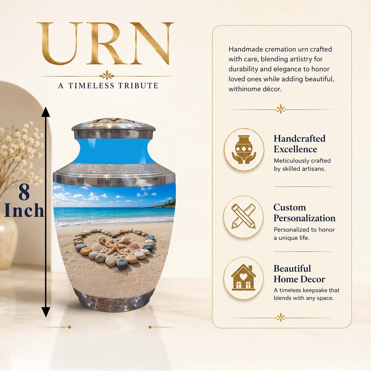 Personalized cremation urn with a beach scene design, shown on a beige background with promotional text and dimensions. The urn has a silver-toned metal top and base, a blue upper band, and a lower section printed with a beach landscape and a heart-shaped stone arrangement on the sand.