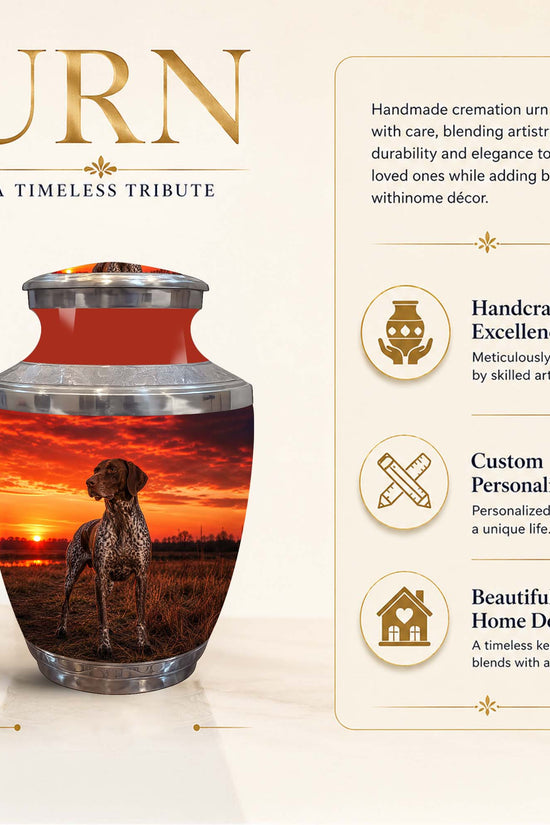 A cremation urn with a sunset landscape print of a dog, shown on a beige background with promotional text and dimensions. The urn has a red interior, a silver metallic rim, and a printed design of a spotted dog standing in a field at sunset.