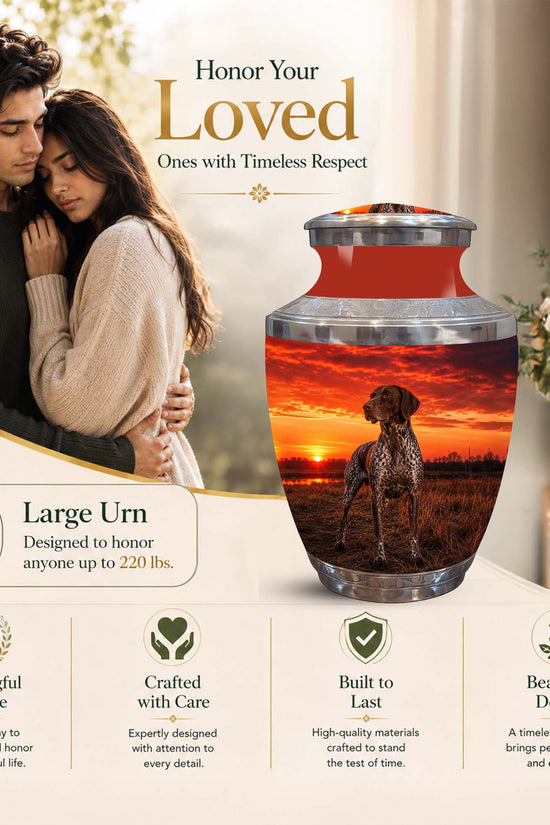 A large memorial urn displayed on a beige promotional background with a couple in a warm photo on the left and product features listed below. The urn has a red-orange gradient top section and a lower section showing a dog standing in a sunset field.