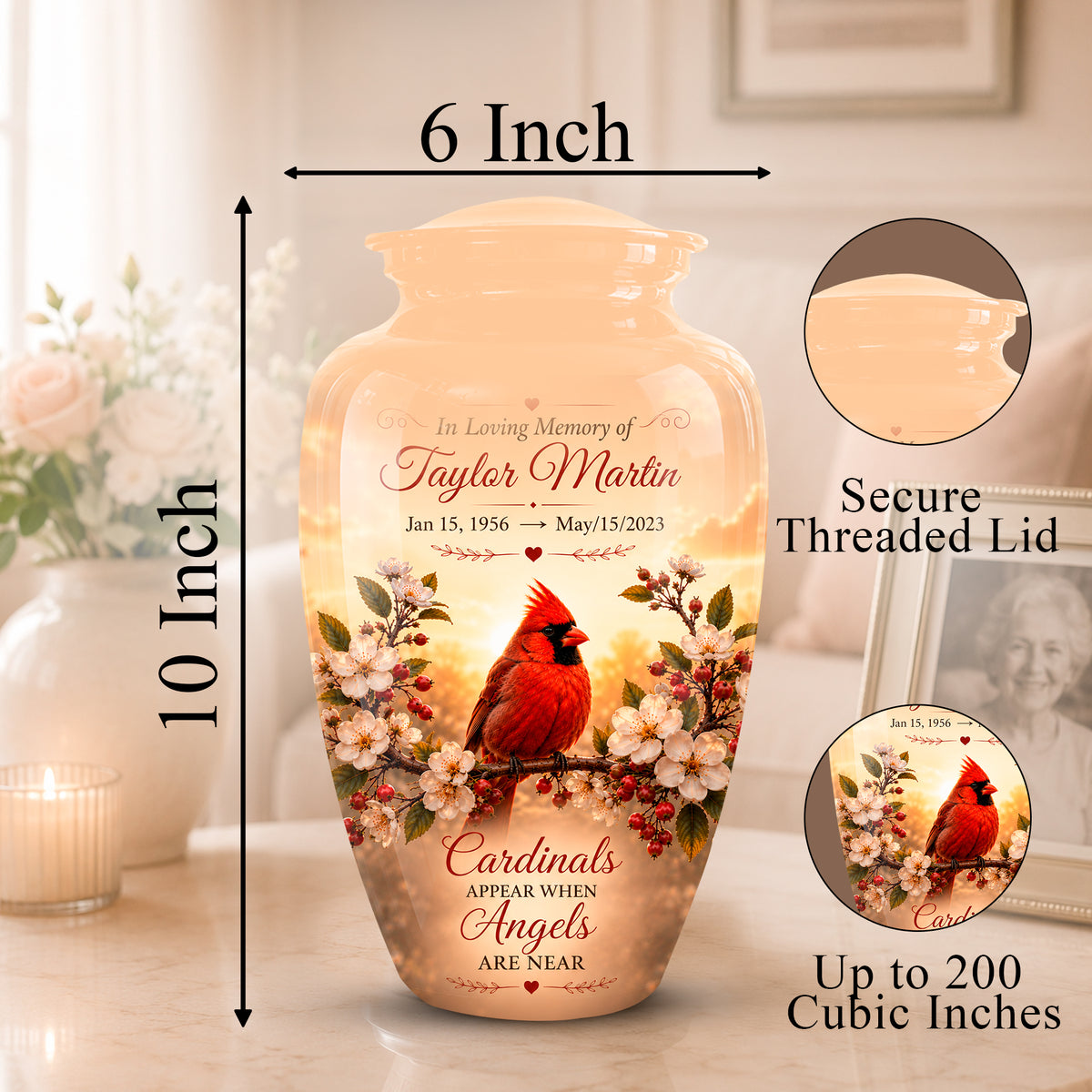 Personalized ceramic memorial urn with a red cardinal and floral design, shown with dimension labels reading 10 inch height, 6 inch width, and a threaded lid inset, on a softly lit indoor background.