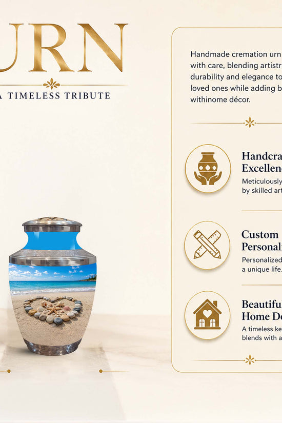 A cremation urn shown on a beige promotional graphic with the word 'URN' at top left and feature callouts on the right. The urn has a printed beach scene with blue sky, white sand, and a circular stone arrangement, plus a metallic gold top and base.