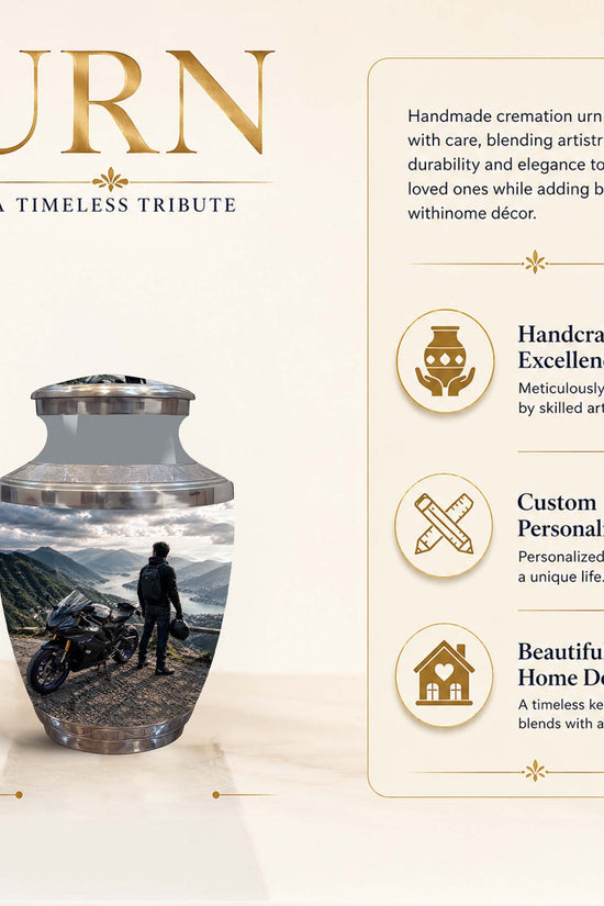 A cream-colored cremation urn with a scenic mountain landscape print and a motorcycle on the front, shown on a beige background with descriptive text and feature icons. The text reads 'URN' and includes details about handcrafted excellence, custom personalization, and beautiful home decor.